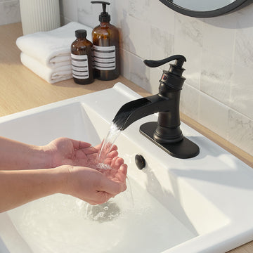 Waterfall Single Hole Single-Handle Low-Arc Bathroom Faucet With Pop-up Drain Assembly in Matte Black